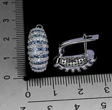 Cargar imagen en el visor de la galería, Aros Zafiro Azul Claro y Topacio Blanco