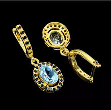 Load image into gallery viewer, Sky Blue Topaz and Gold Sapphire Hoops