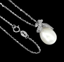 Load image in the gallery viewer, River Pearl and White Topaz Pendant