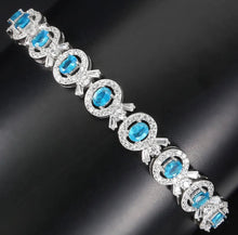 Load image in the gallery viewer, Apatite and White Topaz Bracelet
